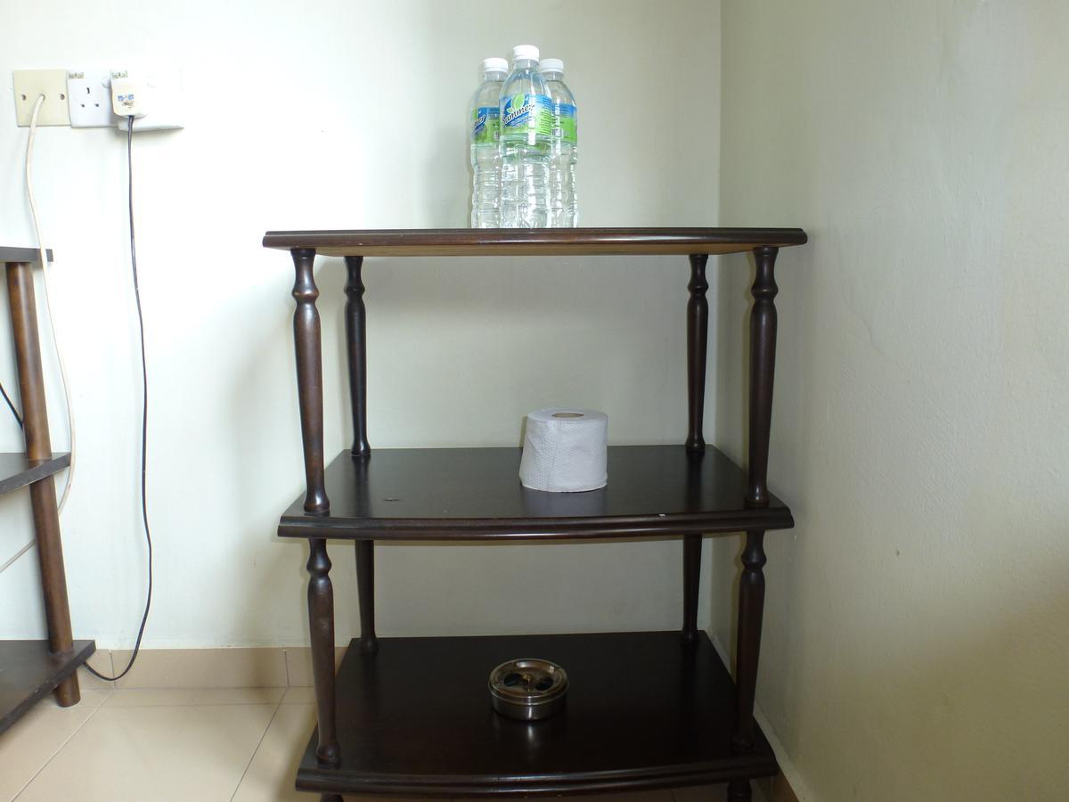 Batu Berendam Inn Kampong Sungai Putat Ngoại thất bức ảnh